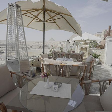 Hotel Queen Cleopatra Pyramids à Le Caire Extérieur photo